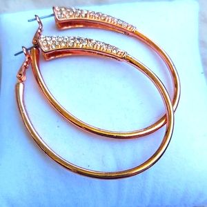 Costume rose colored earrings and bracelets.